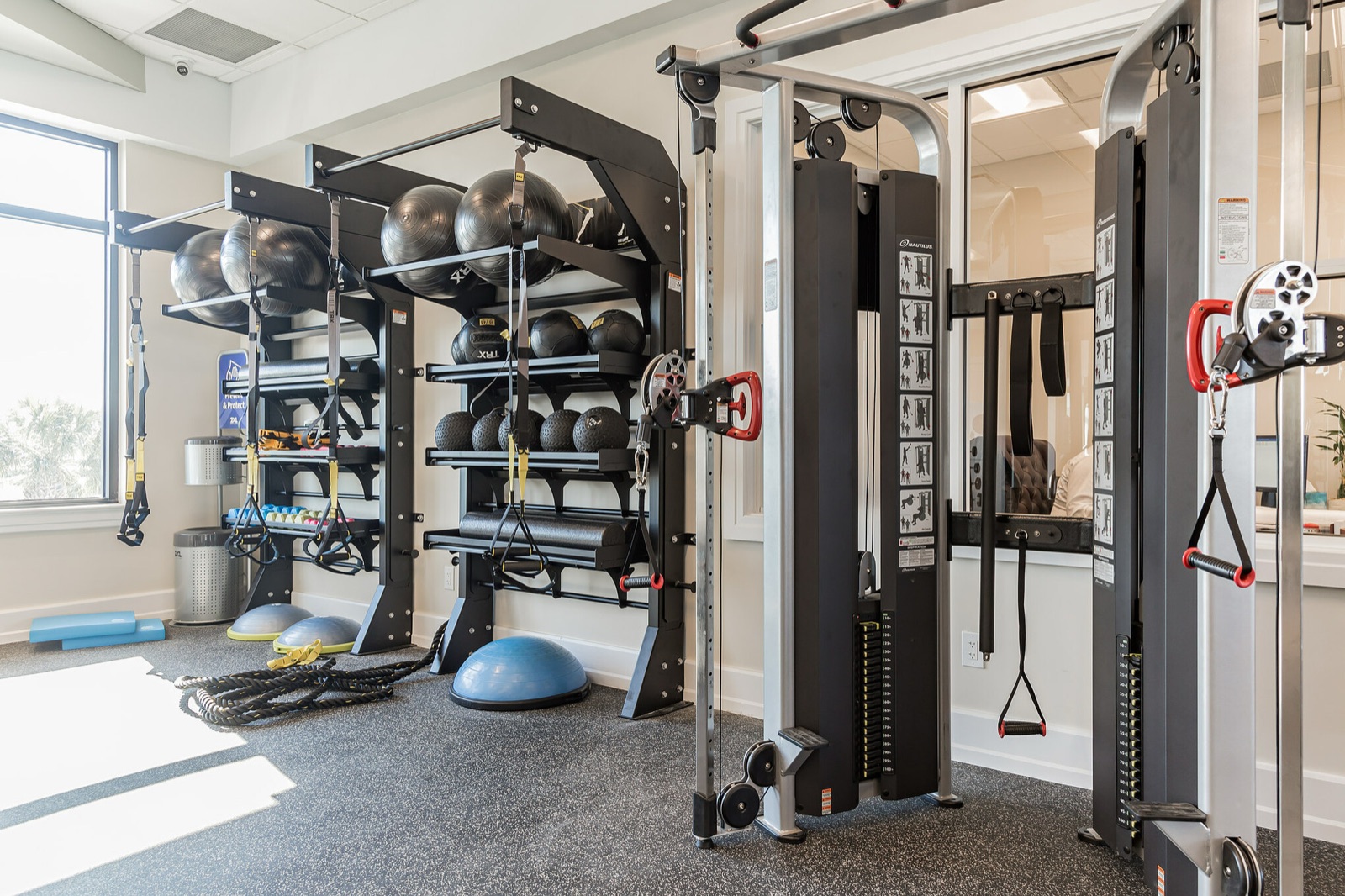 Cable machine and functional trainer in a home gym
